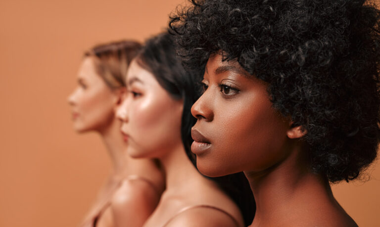 Home multiethnic women on beige background